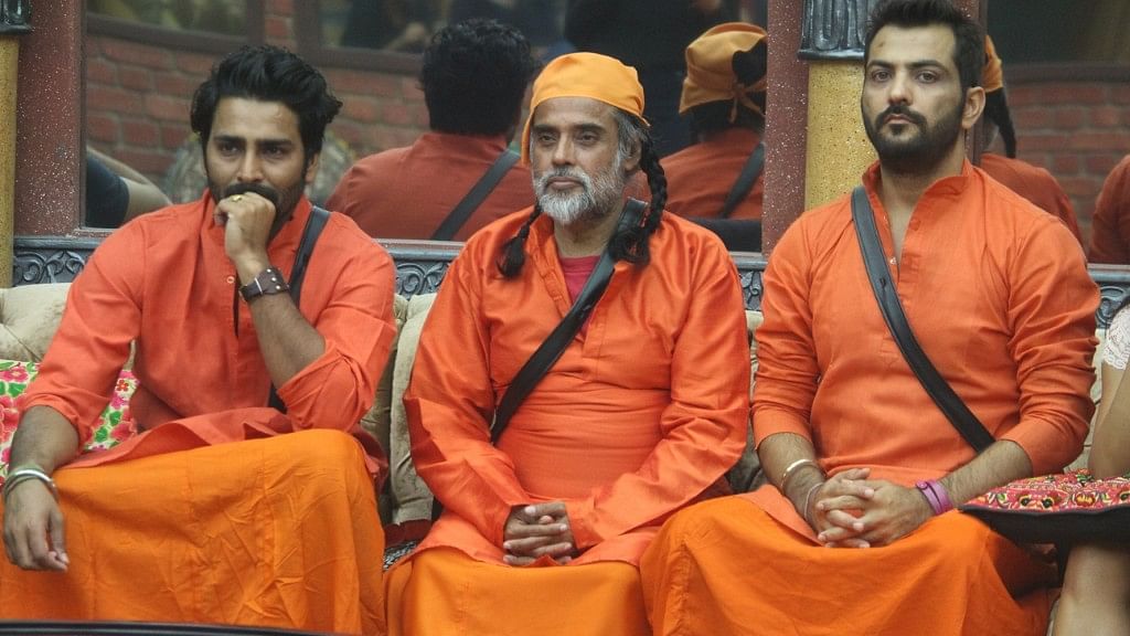 Om Swami flanked by his <i>chela</i>s Manveer and Manu. (Photo courtesy: Colors)