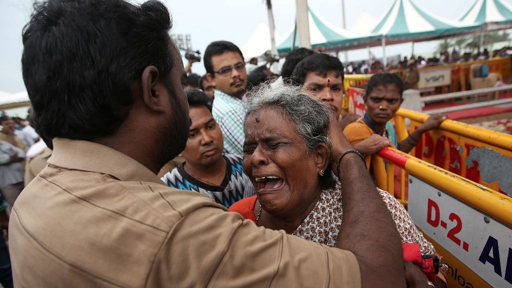 A supporter of J Jayalalithaa breaks down during her funeral. (Photo: Reuters)