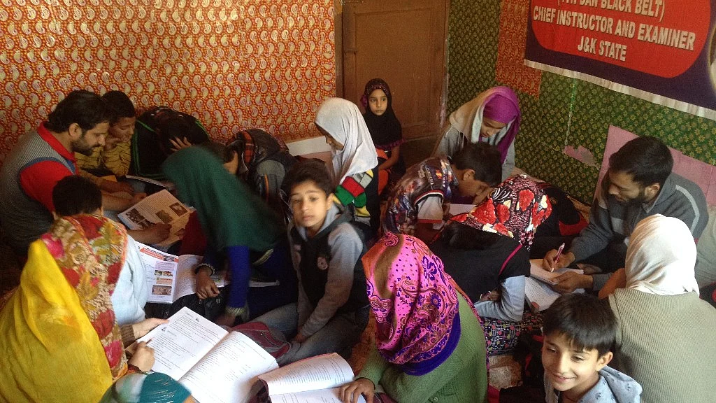 Students would not have been able to sit for exams if not for curfew classes, which were recently renamed as “societal classes”. (Photo: Sheik Majid/ <b>The Quint</b>)