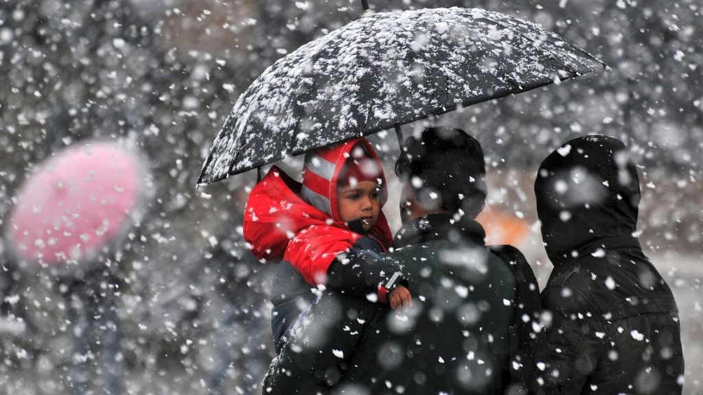 The lower hills across Himachal Pradesh were lashed by rain bringing the temperature down by several notches. (Photo: Reuters)