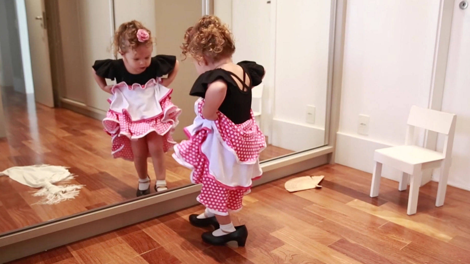 

Gigi Valenti from Brazil, borrows her mother’s shoes and ‘dances everywhere in the house’ - and loves dressing up in the skirt. (Photo Courtesy: AP Videograb)
