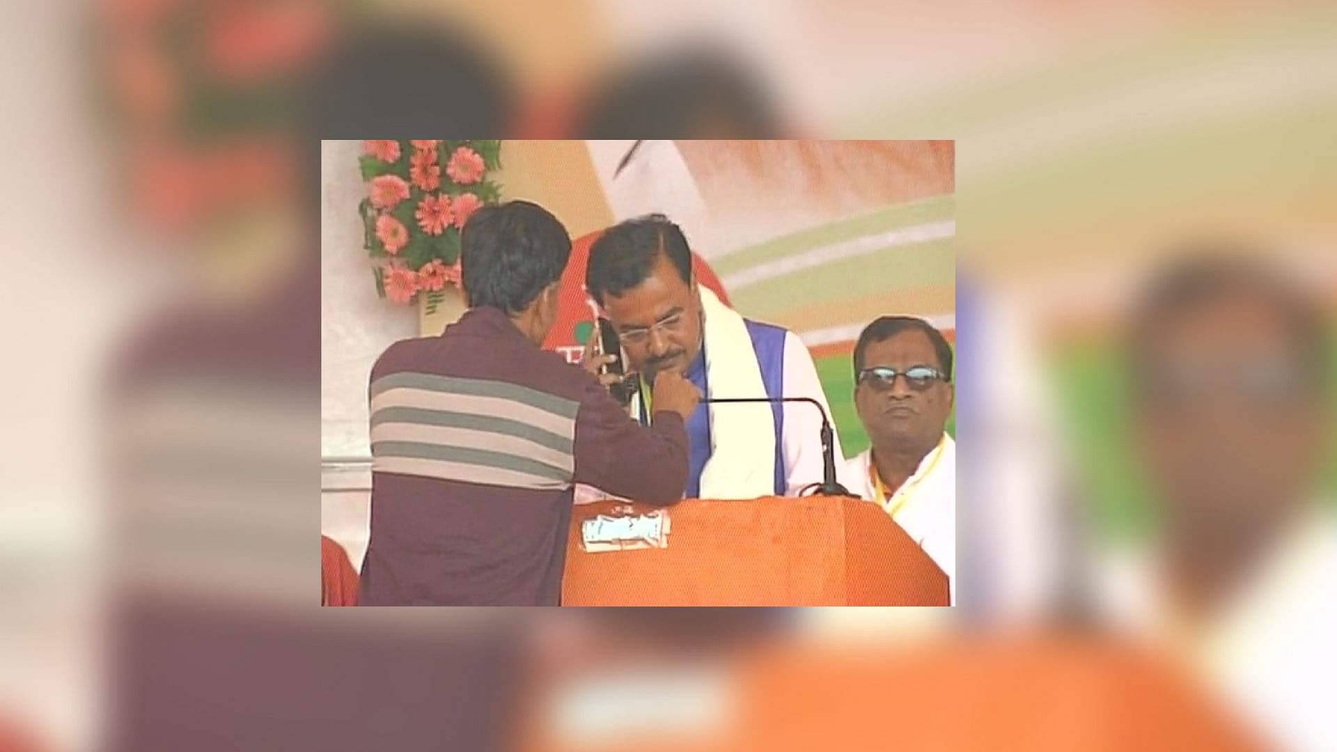 Prime Minister soon addressed the Bahraich gathering through a mobile phone. (Photo Courtesy: Twitter.com/<a href="https://twitter.com/ANI_news">ANI_news</a>)
