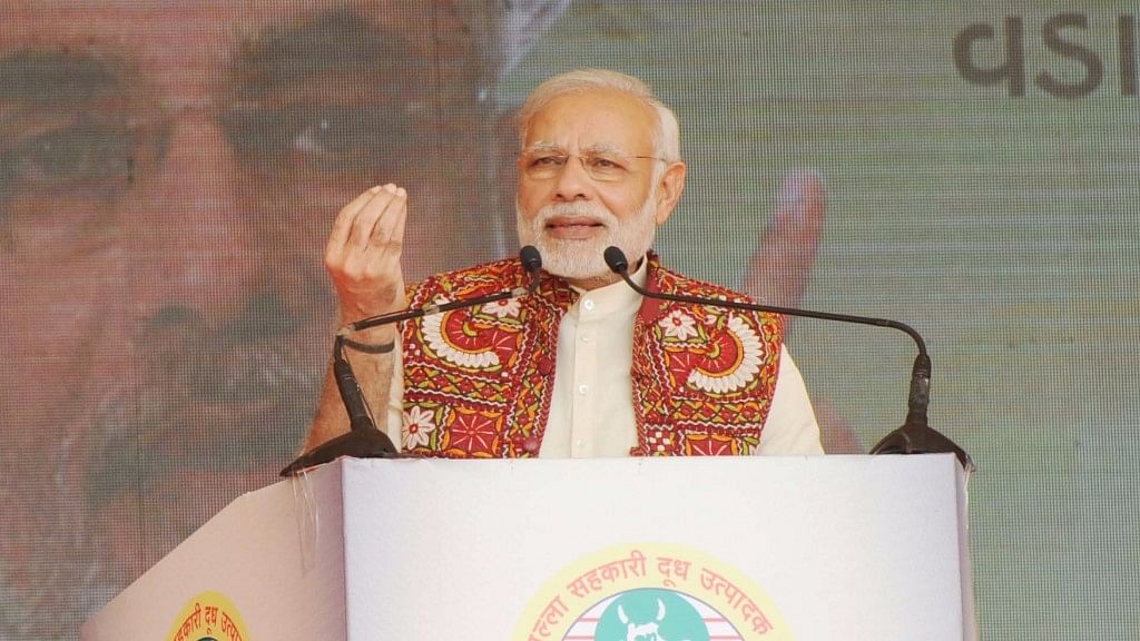 Prime Minister Narendra Modi addressing at the inauguration of the Amul Cheese Plant and Whey Drying Plant, in Palanpur, Banaskantha, Gujarat on Saturday. (Photo: IANS)&nbsp;