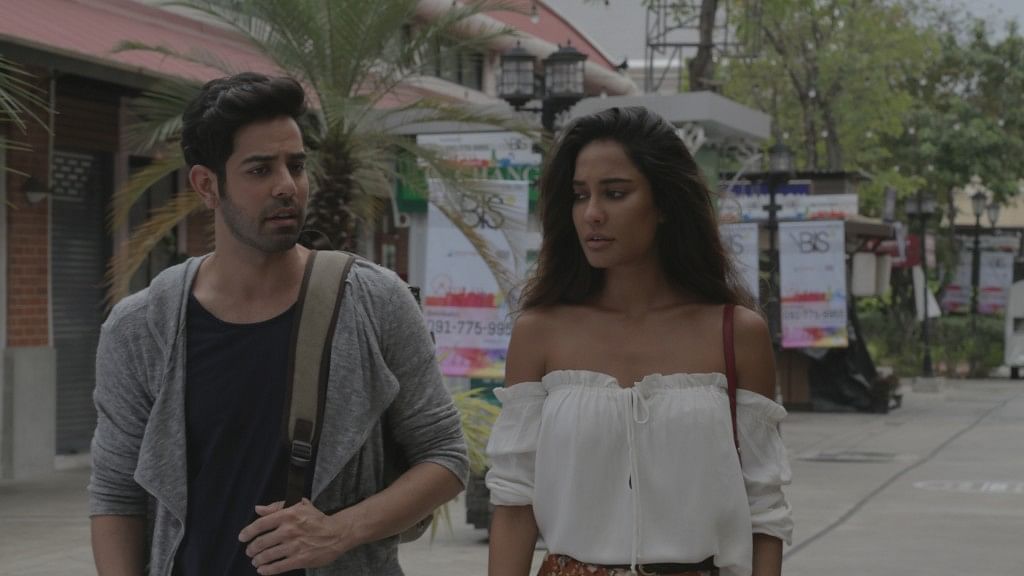 Manish Anand and Lisa Haydon in a still from <i>The Trip</i>. (Photo courtesy: Bindass)