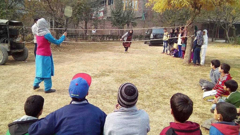 Students play badminton as they take a break from studies. (Photo: Sheik Majid/ <b>The Quint</b>)