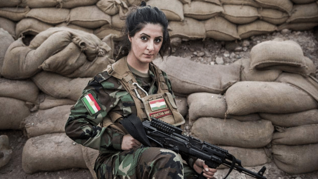 Joanna Palani, the Kurdish European, in military fatigues. (Photo Courtesy: Facebook/<a href="http://https://www.facebook.com/Joanna-Palani-Fan-Club-1679359135684504/photos_stream">Joanna Palani Fan Club</a>)
