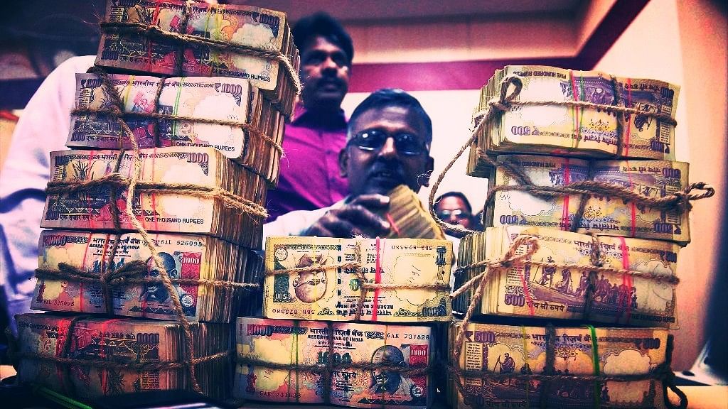 Bundles of old notes of Rs 500 and Rs 1,000. (Photo: PTI)