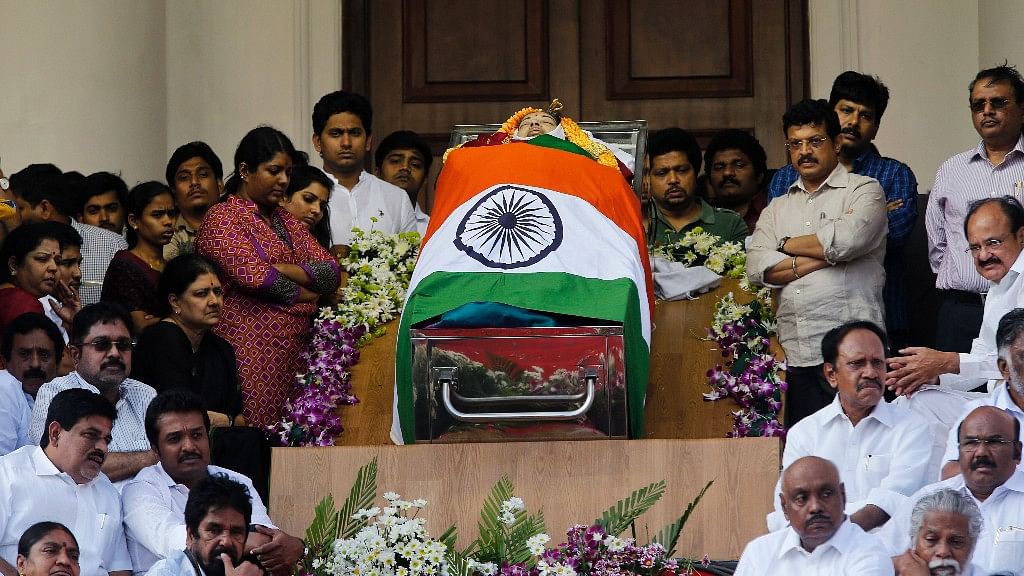 People pay their respects to Tamil Nadu Chief Minister J Jayalalithaa at Chennai’s Rajaji Hall. (Photo: AP)