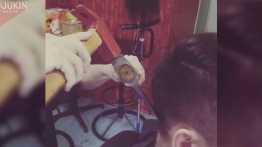 An Axe As A Hair-Cutting Tool? No Kidding, Watch This Video!