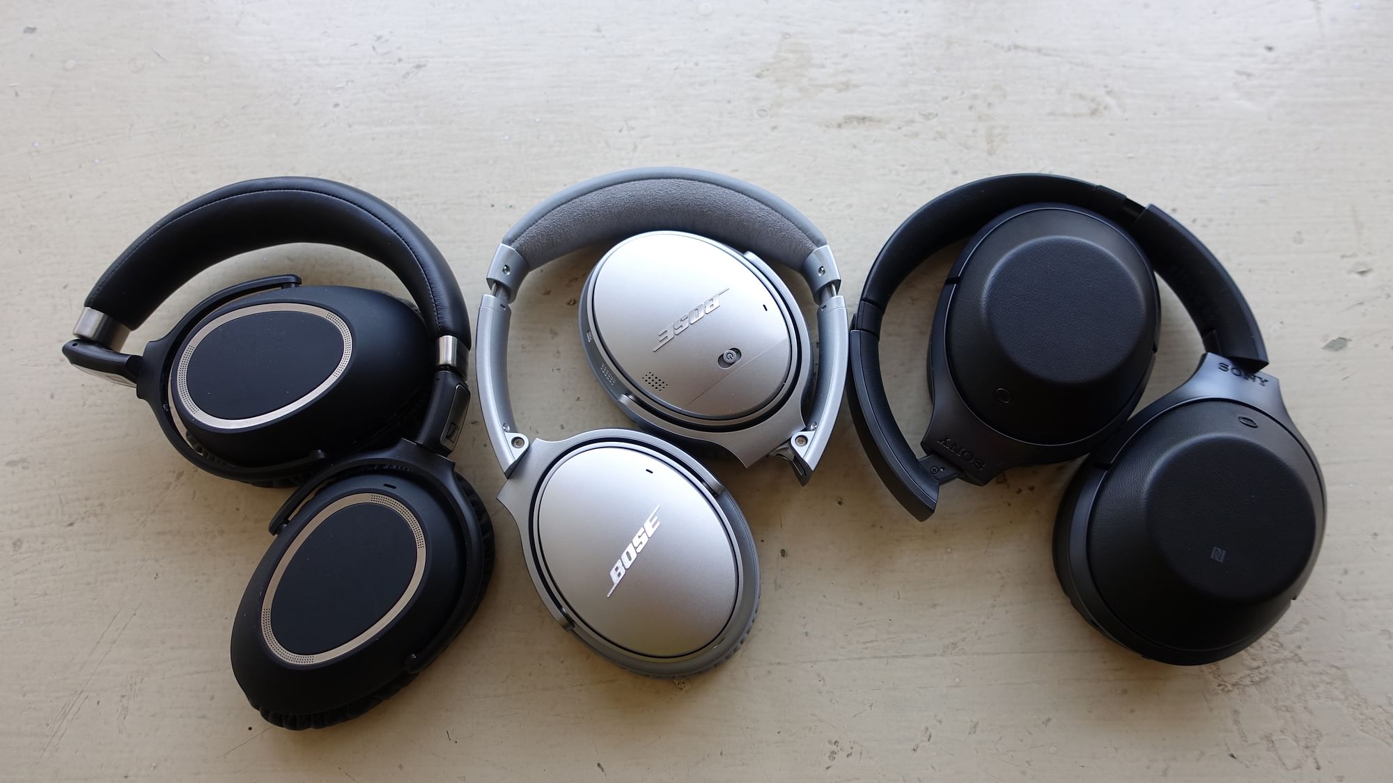 Sennheiser (L), Bose QC35 and Sony (R) headphones. 