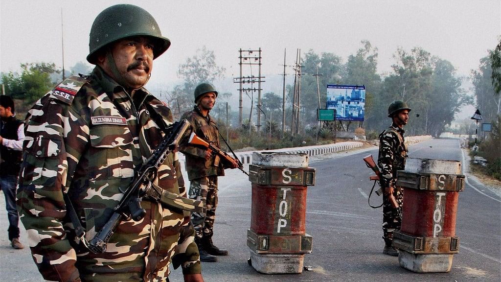 Security personnel stand guard during combing operations after the attack in Nagrota. (Photo: PTI)