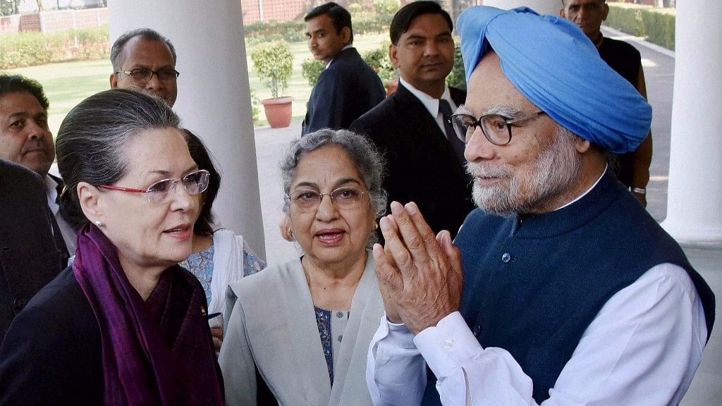 Sonia Gandhi with Manmohan Singh. (Photo: PTI)