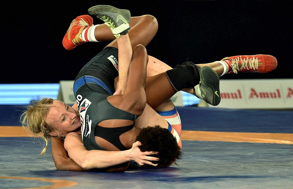 Haryana Hammers’ Sofia Mattson (red) competes against Odunayo Folasade Adekuoroye of Punjab Royals in the women’s 53 kg category. (Photo: PTI)