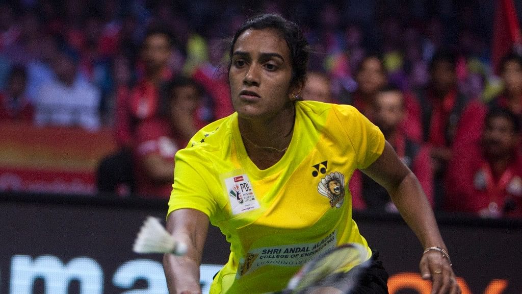 Chennai Smashers PV Sindhu returns a shot to Carolina Marin of Hyderabad Hunters during the women’s singles of Premier Badminton League (PBL) in Hyderabad. (Photo: AP)