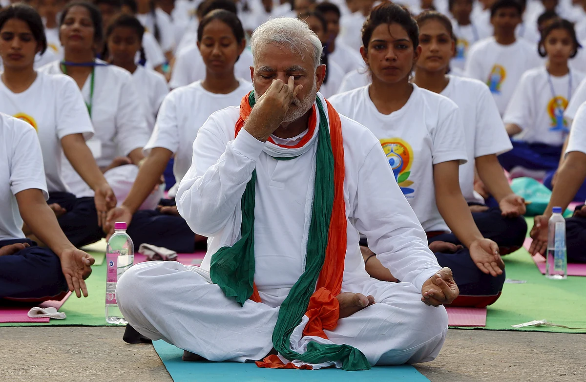 Prime Minister Narendra Modi performs yoga with
others during a yoga camp to mark the International Day of Yoga, in New Delhi,
India on June 21, 2015. (Picture: Reuters)