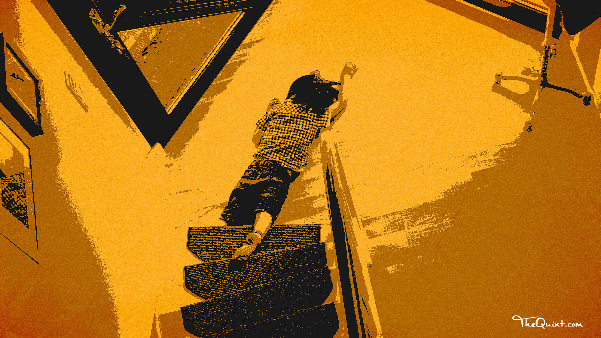 A woman throws her child off a staircase in New Delhi. (Photo Courtesy: The Quint)