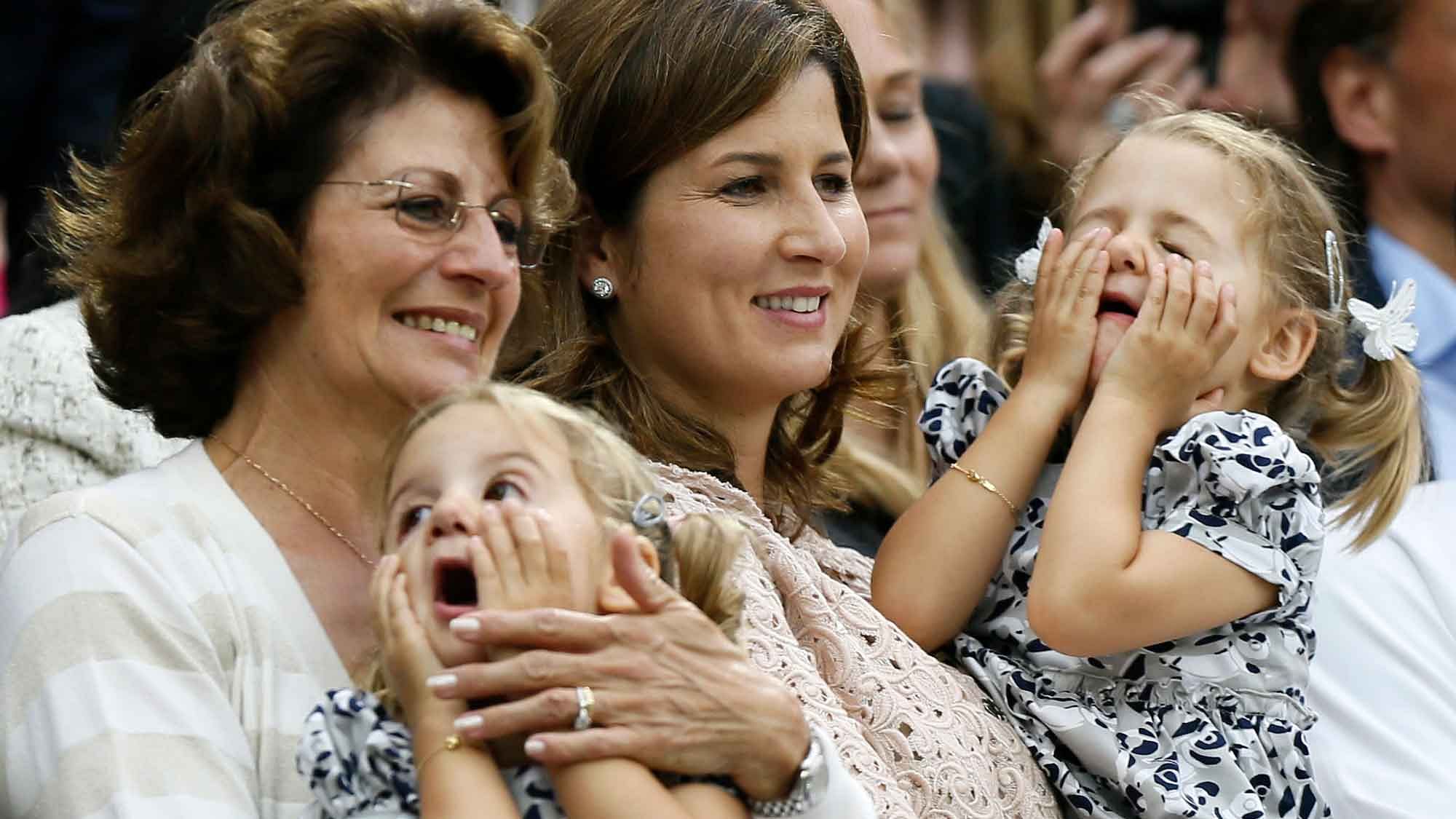 The wife of Roger Federer of Switzerland, Mirka Federer (C) with twins Charlene Riva and Myla Rose at the Wimbledon Championships in 2012. (Photo: Reuters)