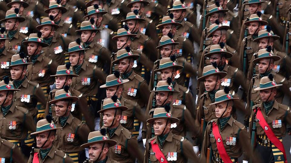 Indian soldiers march during a full dress rehearsal for the Republic Day parade in New Delhi.
