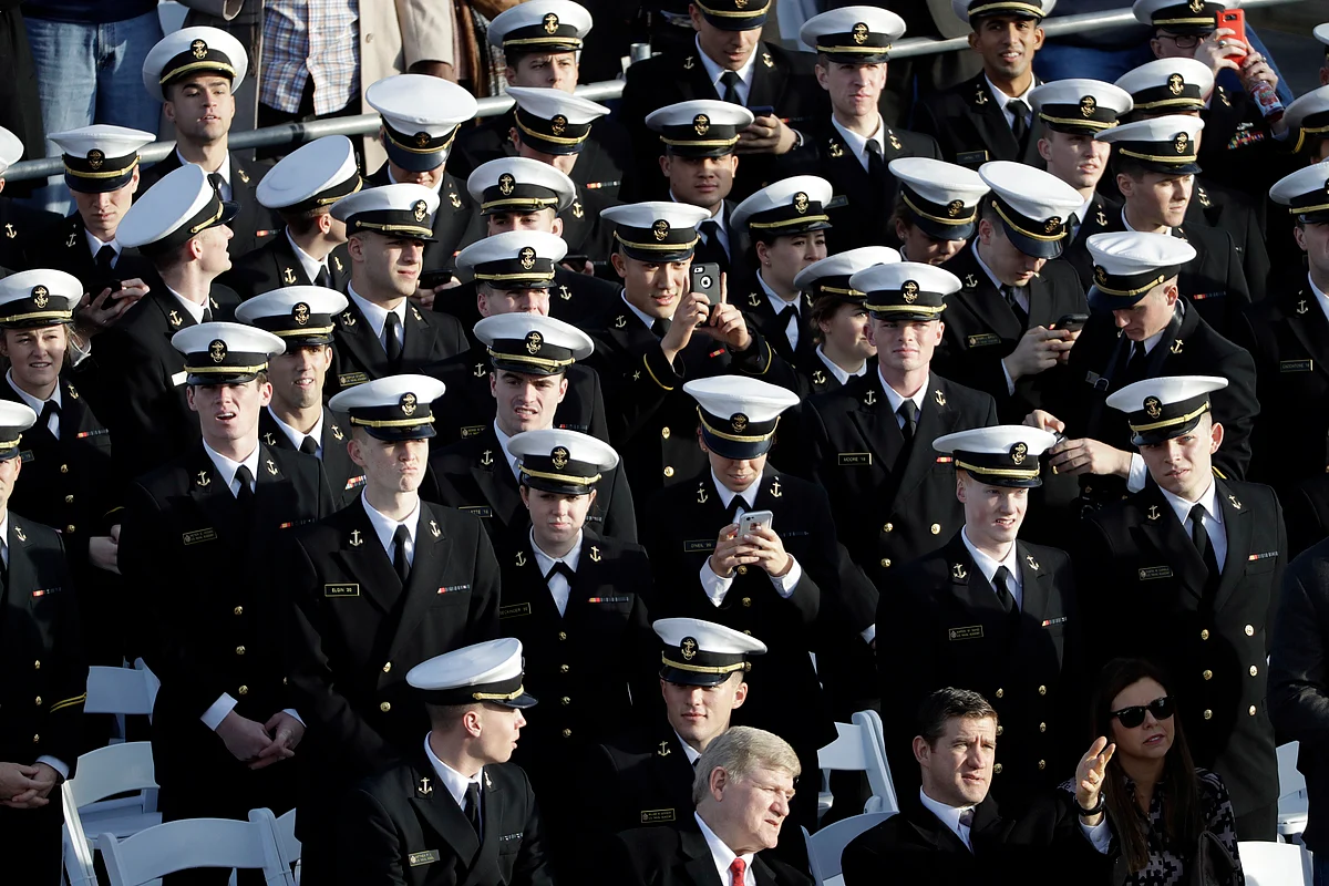 Navel Academy cadets wait for the start of a pre-Inaugural “Make America Great Again! Welcome Celebration” at the Lincoln Memorial in Washington. (Photo: AP)