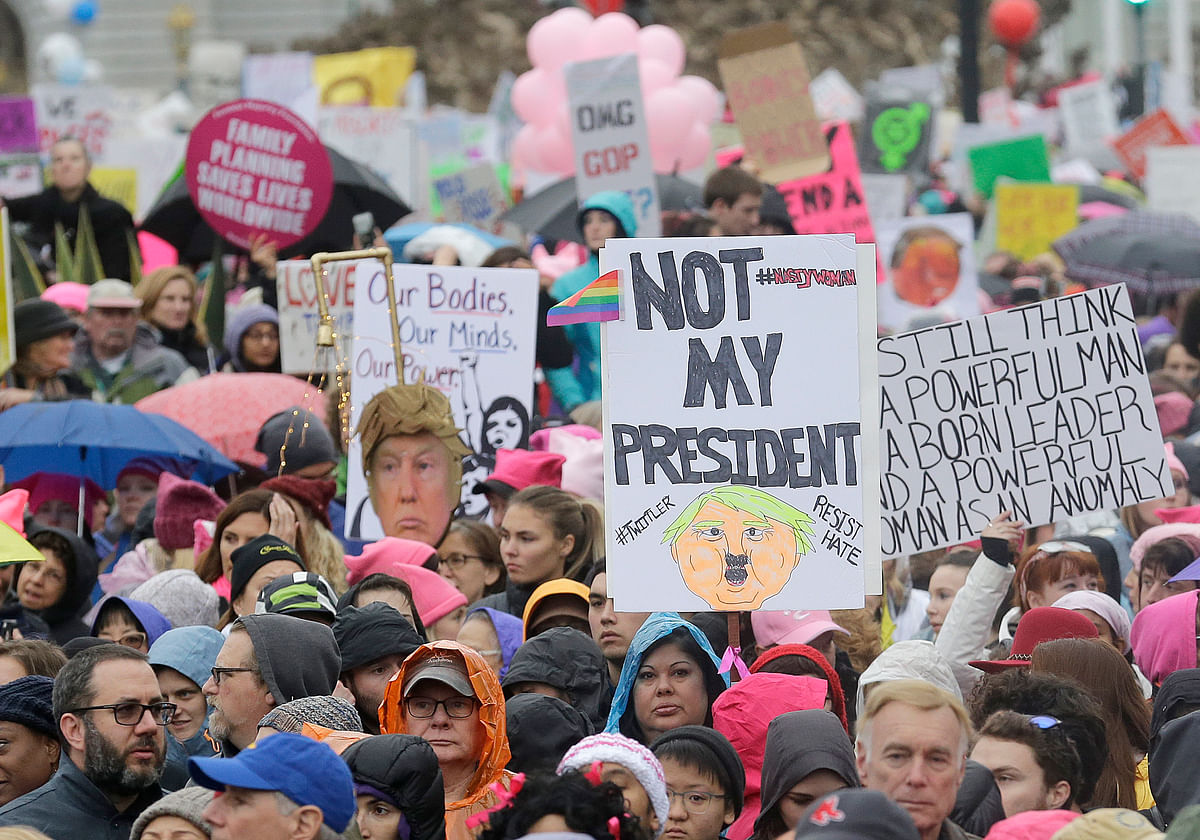 

The marches included plenty of men, too — some of them wearing “pussyhats” in solidarity.