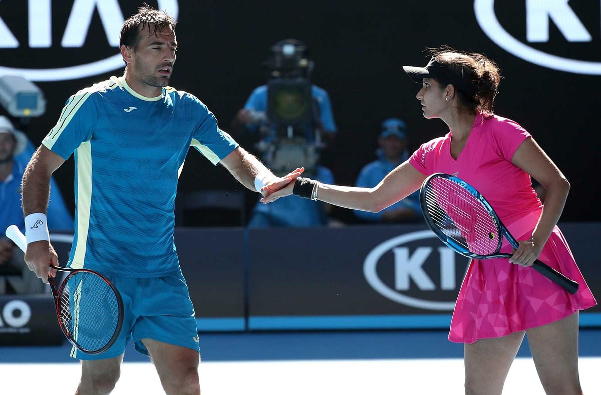 Second runners-up finish at a Slam for Sania and Dodig together .
