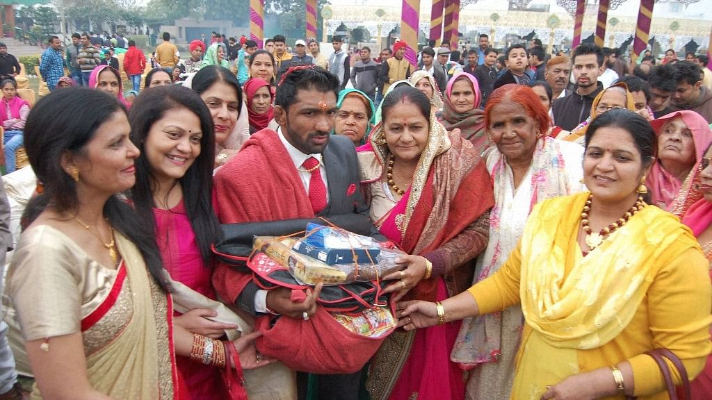 Star wrestler Yogeshwar Dutt during a ceremony  ahead of his marriage with Sheetal, daughter of Jai Bhagwan Sharma, a Congress leader in Sonepat on Saturday. (Photo: PTI)