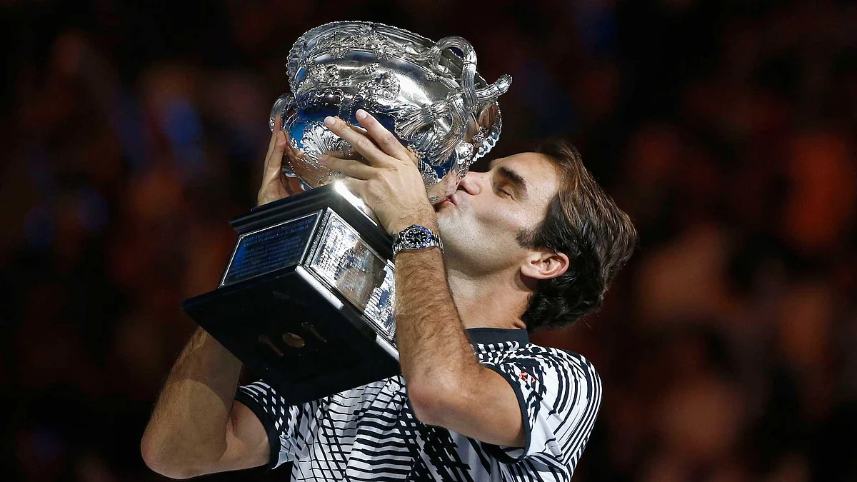 Roger Federer with the Australian Open trophy he won in 2017. 