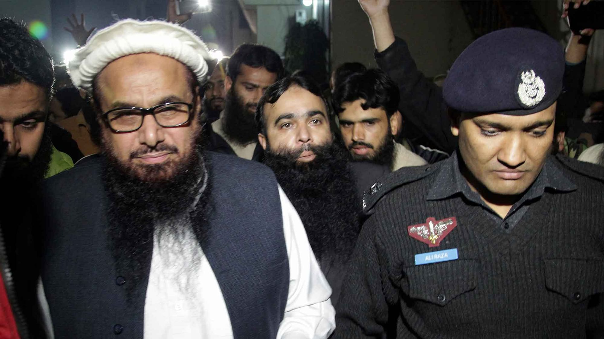 Hafeez Saeed talks to the press after the six-month house arrest order. (Photo: AP)