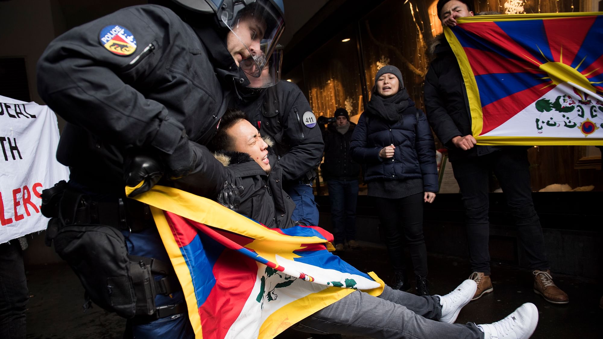People protest for a free Tibet and against the arrival of China’s President Xi Jinping in Bern, Switzerland, on Sunday, 15 January 2017. (Photo Courtesy: AP Exchange)