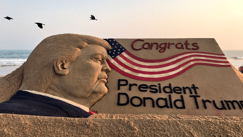 Sand artist Sudarsan Pattnaik has paid tribute to Donald Trump, who will take charge as the 45th President of the US on Friday. (Photo Courtesy: Twitter/<a href="https://twitter.com/sudarsansand/status/822321969475395584">sudarsansand)</a>