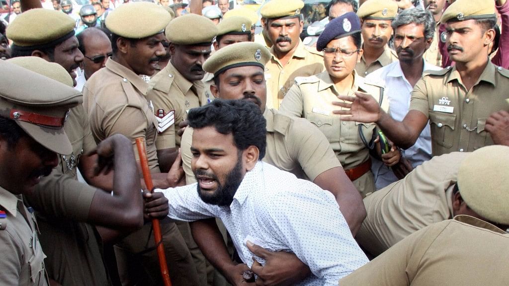 Policemen clearing students from the protest area in Coimbatore on Monday. (Photo: PTI)