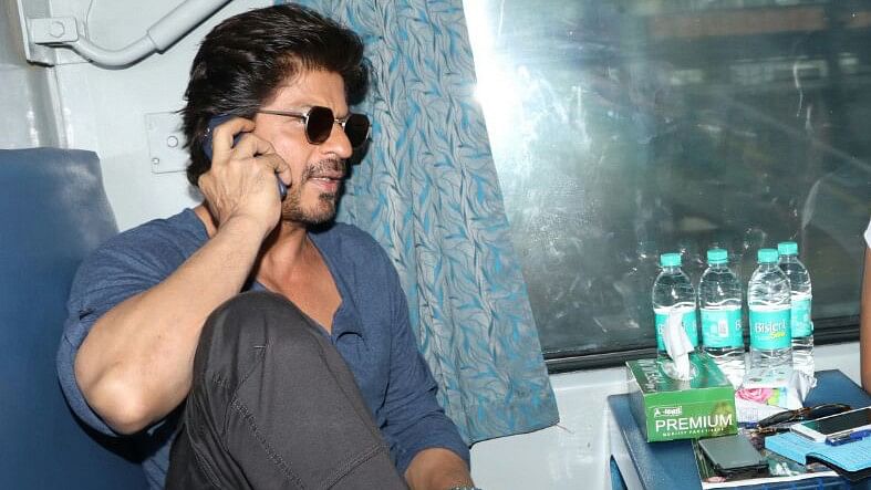 SRK gets candid on a train ride to Delhi. (Photo: Yogen Shah)