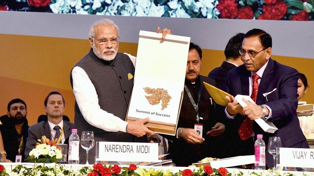 Prime Minister Narendra Modi releases a publication at the inauguration of Vibrant Gujarat Global Summit 2017 in Gandhinagar, Gujarat on Tuesday.&nbsp;