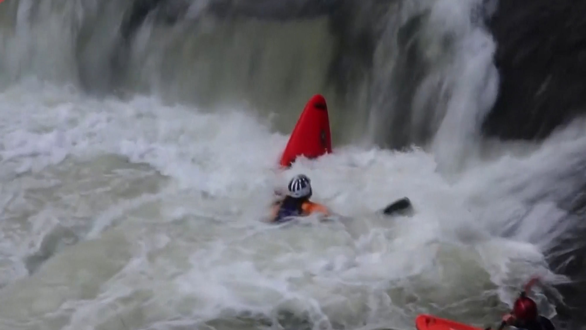 Kayaker gets stuck in a water fall (Photo: AP Screengrab)