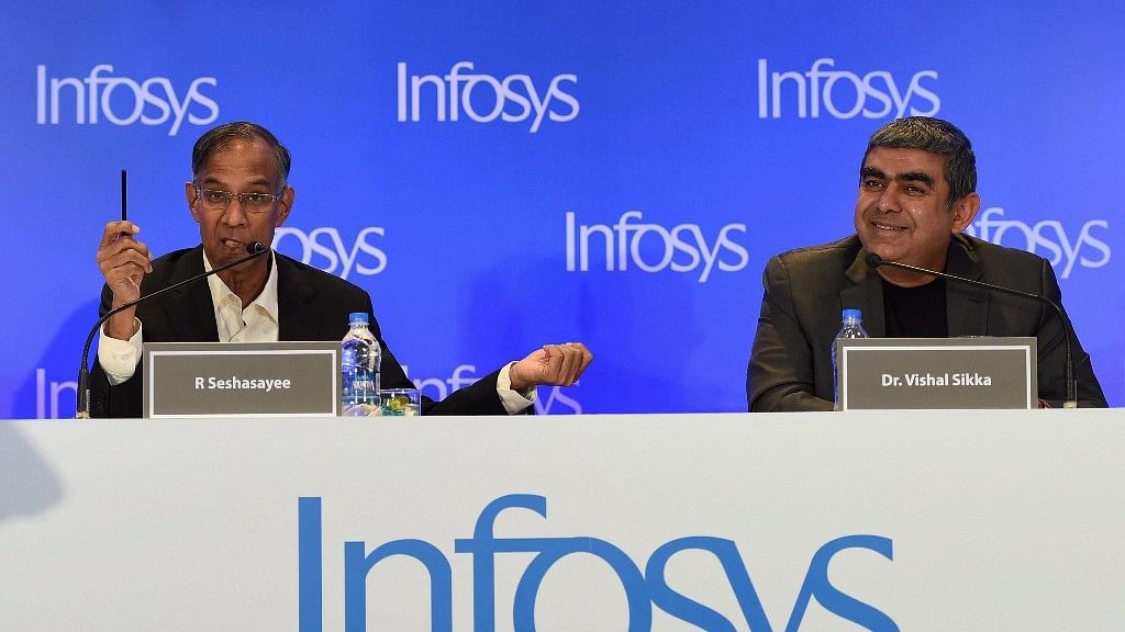 R Seshasayee, Chairman of Board, Infosys and Infosys CEO, Vishal Sikka addresses a press conference in Mumbai on Monday. (Photo Courtesy: PTI)
