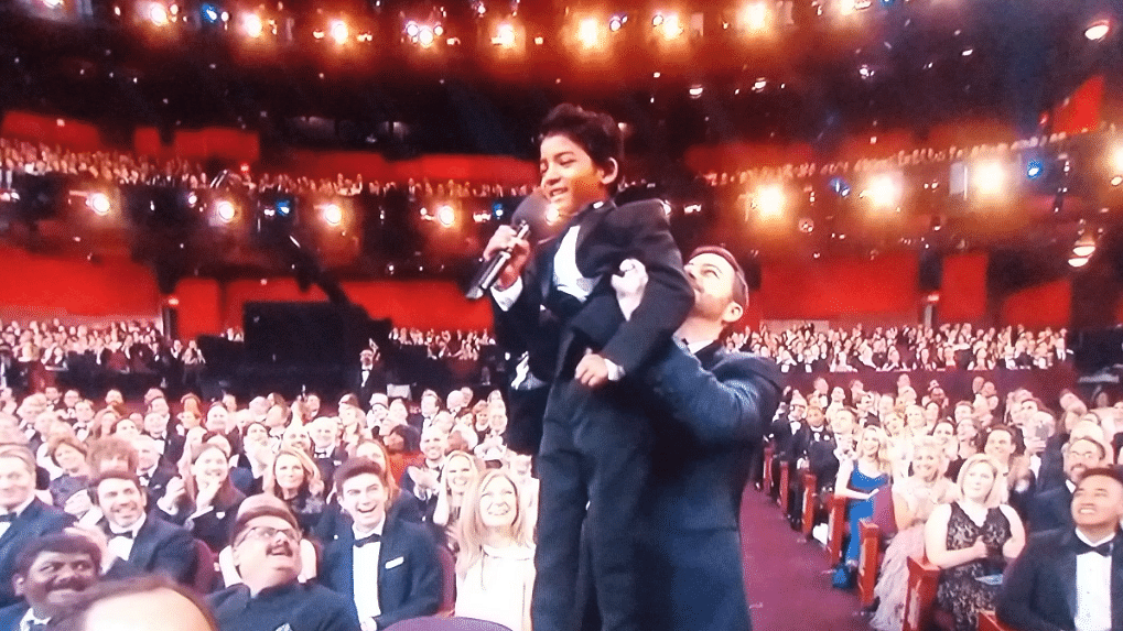 Sunny Pawar gets a lift from Jimmy Kimmel. (Photo courtesy: Twitter)