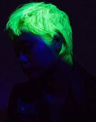 Lir’s neon yellow hair glow in the dark, attracting a lot of attention at parties (Photo: Karishma Bedi Photography/ Rod Anker Salons)