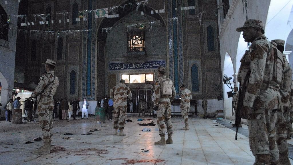 Pakistani paramilitary soldiers at the site of the suicide attack at the Lal Shahbaz Qalandar shrine in Sehwan. (Photo: AP)