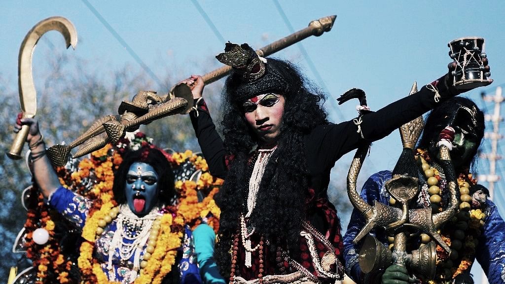 Devotees participate in a procession on the eve of Maha Shivratri in Jammu. (Photo: AP)