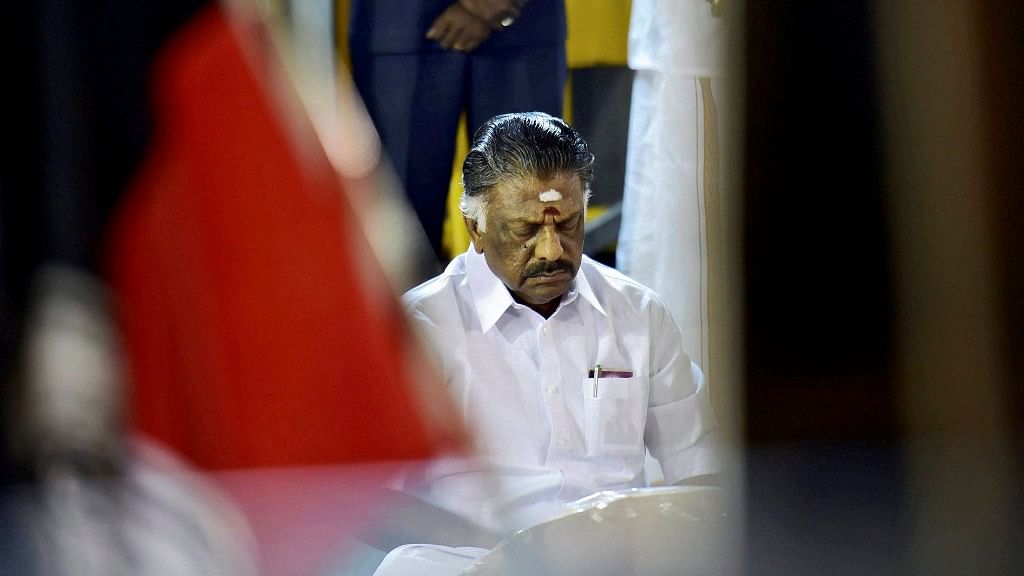 O Panneerselvam meditating at Jayalalithaa’s memorial. (Photo: PTI)