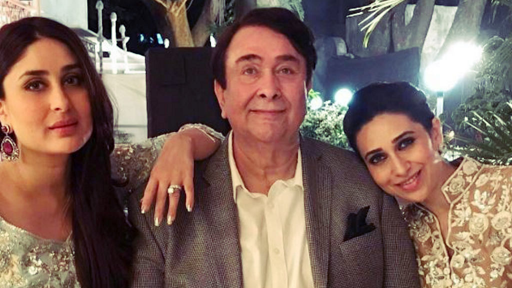 Randhir Kapoor poses with his daughters Kareena and Karisma Kapoor.