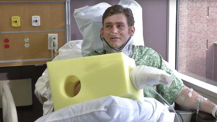 Grillot during an interview from his hospital bed. (Photo Courtesy: YouTube/<a href="https://www.youtube.com/channel/UCEPoZX5aGC0rGnMqlMkJBxQ">KUHospital</a>)