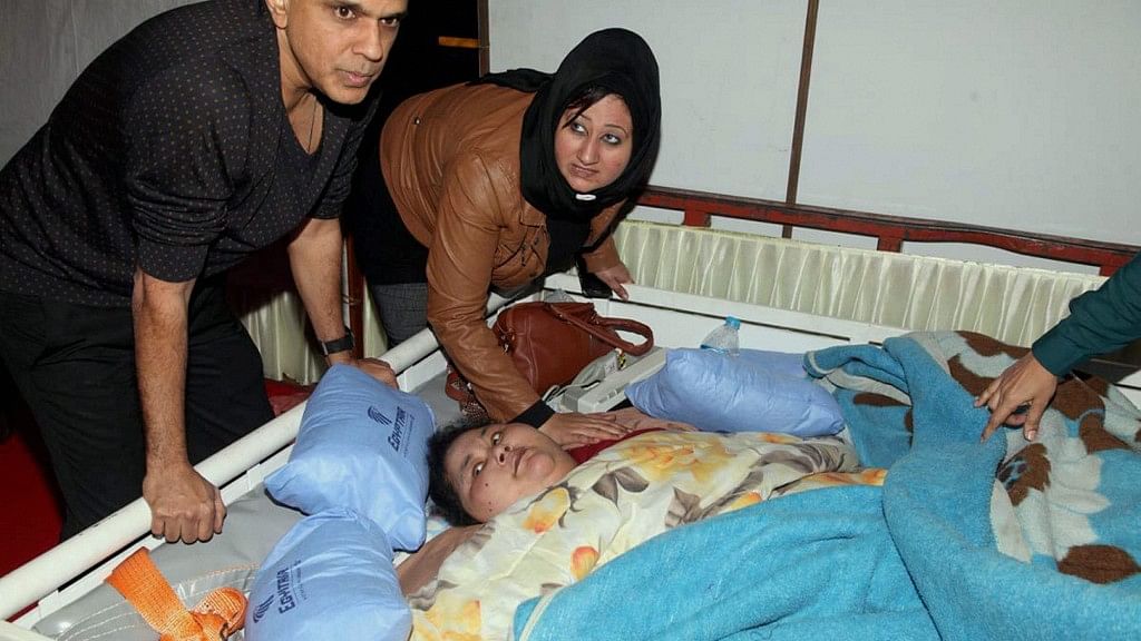 Dr Muffazal Lakdawala near his Egyptian patient Eman Ahmed, one of the heaviest women in the world weighing 500 kg, who has arrived for weight reduction treatment in Mumbai on Saturday. (Photo Courtesy: PTI)