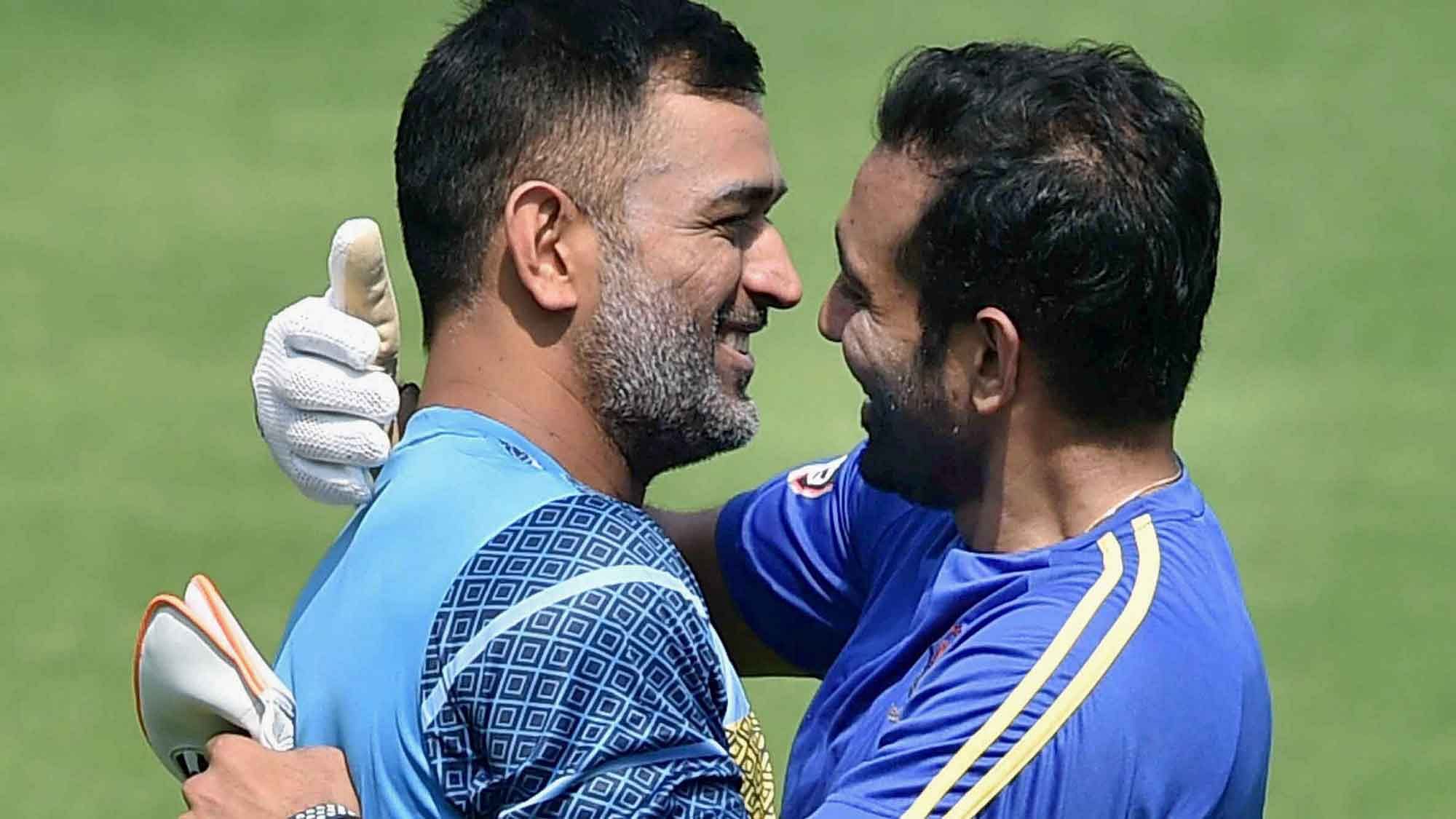 MS Dhoni met Robin Uthappa at a training session at Eden Gardens. (Photo: PTI)