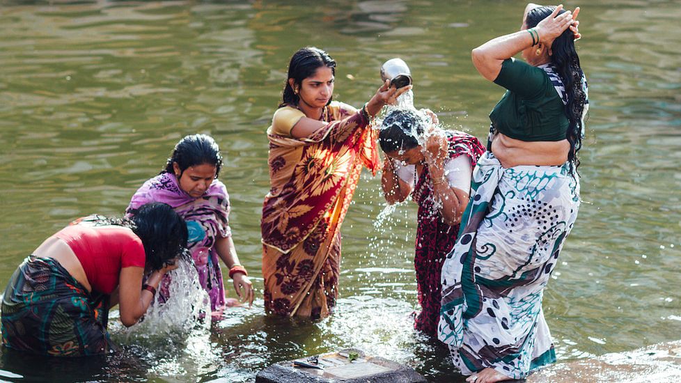 In many villages, an informally decided upon time is kept aside for women taking a bath in a group. (Photo: Adam Cohn)&nbsp;