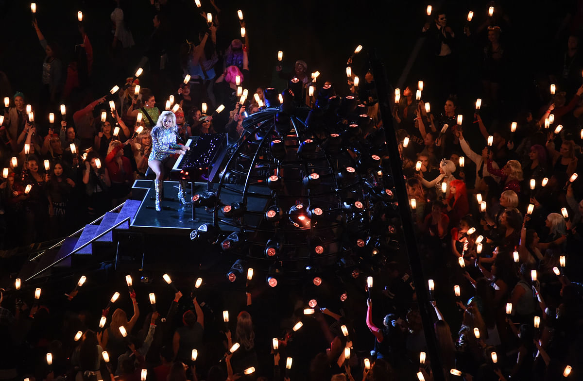 

Lady Gaga sent a subtle message of inclusion & unity in a deeply divided US by singing God Bless America.