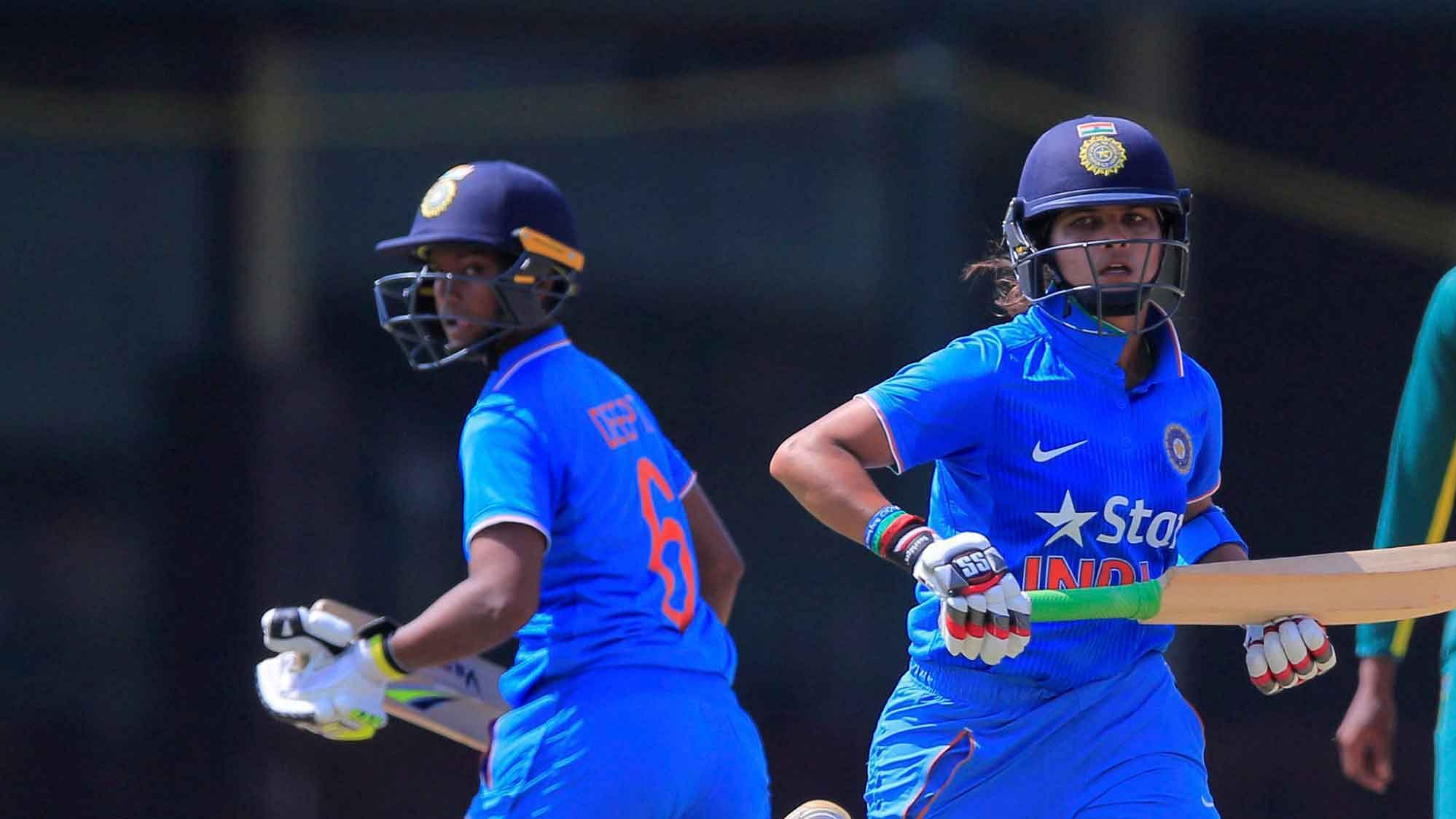 India’s Mona Meshram, right, and Deepti Sharma run between wickets during a ICC Women’s World Cup Qualifier one day international cricket match in Colombo. (Photo: PTI)