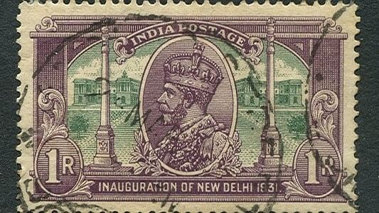 The 1931 series celebrated the inauguration of New Delhi as the seat of government. The one rupee stamp shows George V with the “Secretariat Building” and Dominion Columns. 