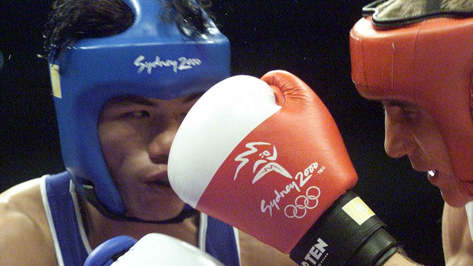 Dingko Ngangom Singh (L) in action during the Sydney Olympic Games, September 21, 2000. (Photo: Reuters)