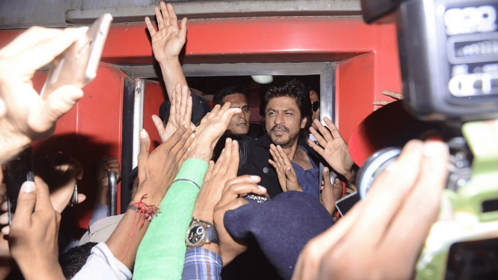 Shah Rukh Khan waves at fans at a railway station. (Photo courtesy: Twitter)